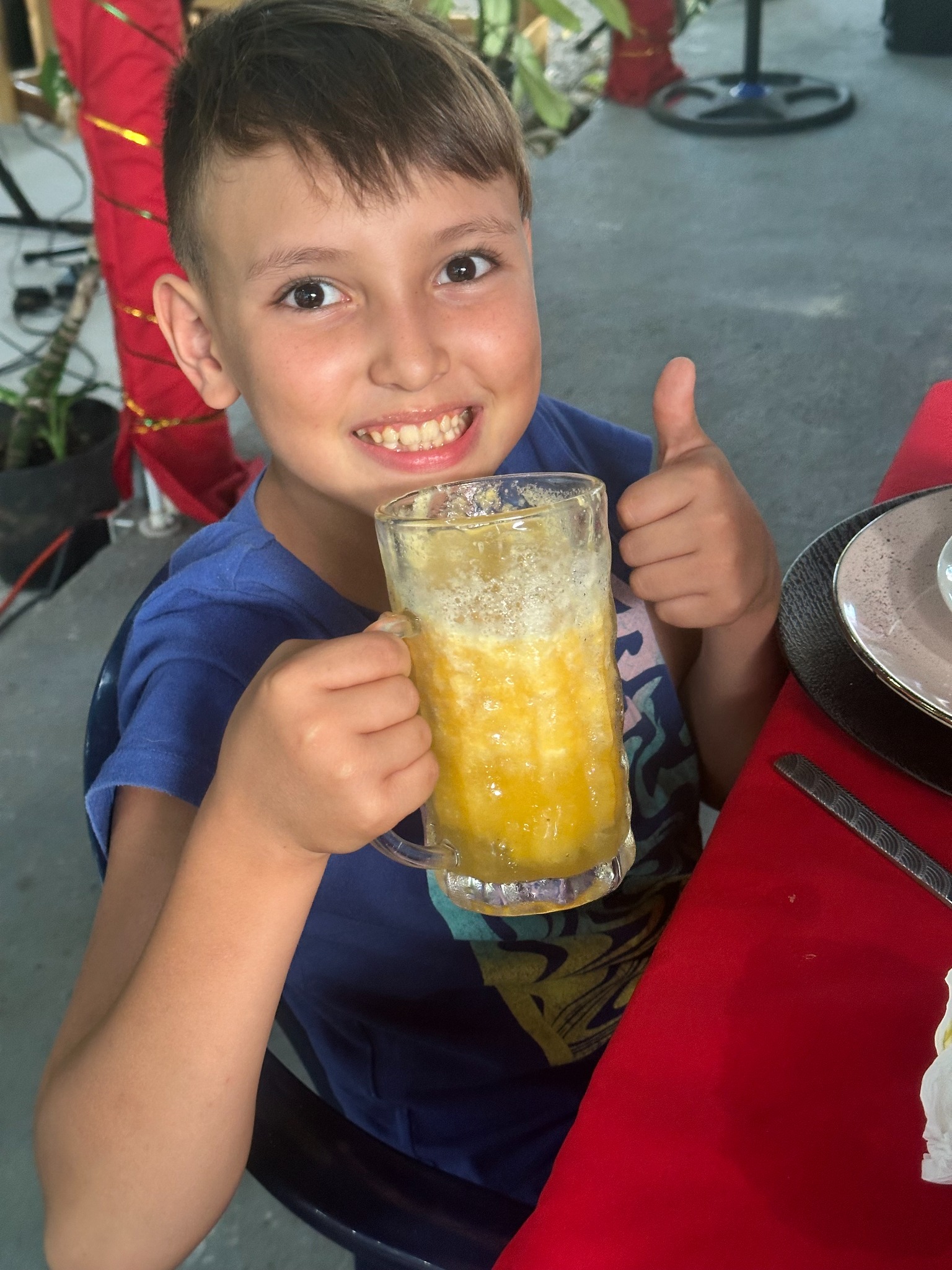 Young guest enjoying a tropical drink